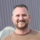 Close-up portrait of a smiling man